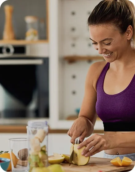 woman cutting vegetables in the kitchen